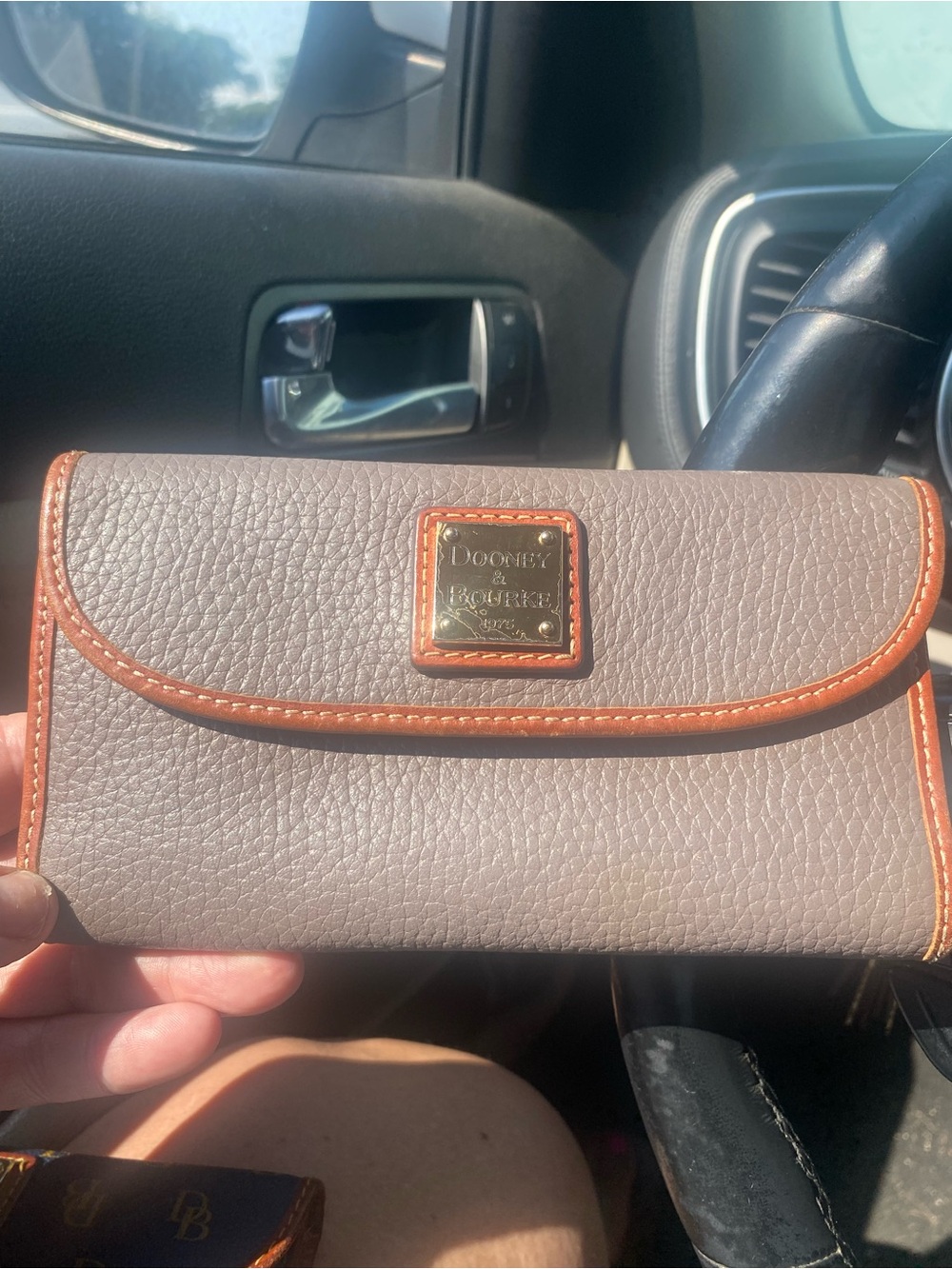 Dooney & Bourke Taupe Wallet with Brown Trim and Gold Plaque